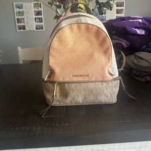 Michael kors fashion backpack/purse, lightly used and in great condition